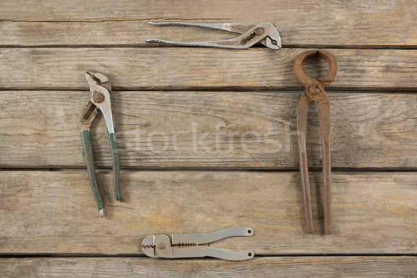 Rusty herramientas mesa de madera vista mesa rojo Foto stock © wavebreak_media