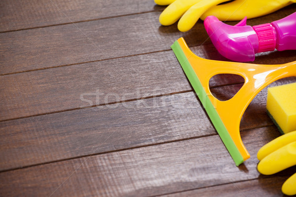 Cleaning equipment arranged on wooden floor Stock photo © wavebreak_media