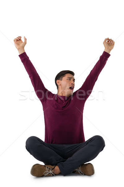 Businessman with arms raised yawning Stock photo © wavebreak_media