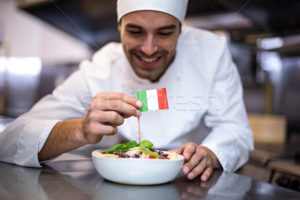 Bonito chef refeição bandeira italiana comercial Foto stock © wavebreak_media