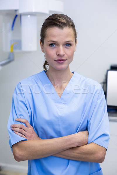 Portrait of dental assistant standing with arms crossed Stock photo © wavebreak_media