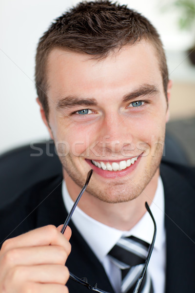 Good-looking businessman with glasses in his office Stock photo © wavebreak_media