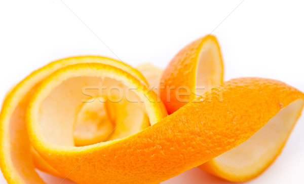 Stock photo: Orange skin against white background 