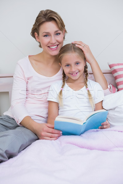 Mother with her daughter at bedtime Stock photo © wavebreak_media