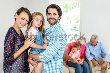 Famille cadeaux séance chambre souriant maison [[stock_photo]] © wavebreak_media