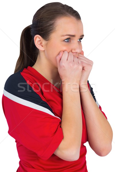 Stock photo: Nervous football fan in red