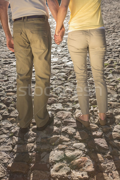 Gelukkig holding handen voorjaar man Stockfoto © wavebreak_media