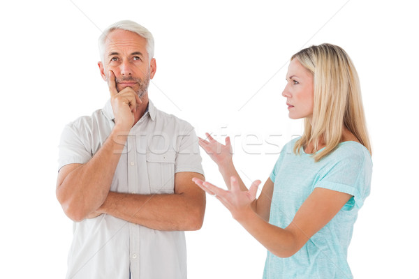 Unhappy couple having an argument with man not listening Stock photo © wavebreak_media