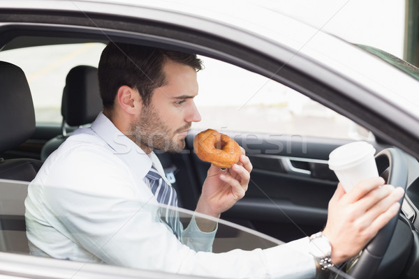 Jonge zakenman koffie donut auto business Stockfoto © wavebreak_media