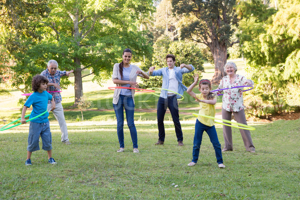 Extended family playing with hula hoops Stock photo © wavebreak_media