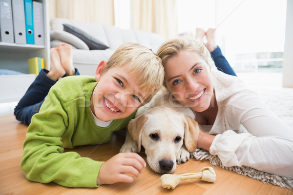 Happy mother and son with puppy Stock photo © wavebreak_media