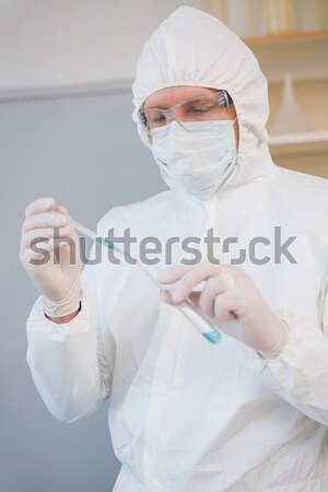 Scientist doing experimentations in petri dish  Stock photo © wavebreak_media
