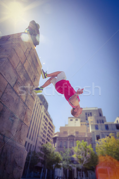 Happy man doing parkour Stock photo © wavebreak_media