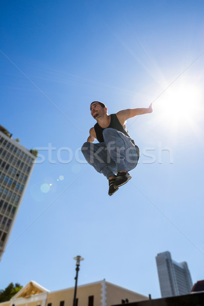  Man doing parkour in the city Stock photo © wavebreak_media