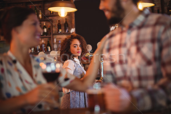 Jealous woman looking at couple flirting with each other Stock photo © wavebreak_media