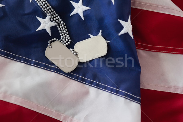 Close-up of dog tag on an American flag Stock photo © wavebreak_media