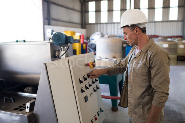 Attentive technician operating a machine Stock photo © wavebreak_media