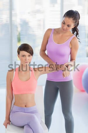 Athletic serious women posing arms crossed Stock photo © wavebreak_media