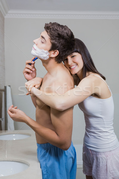 Bathroom routine for happy young couple Stock photo © wavebreak_media