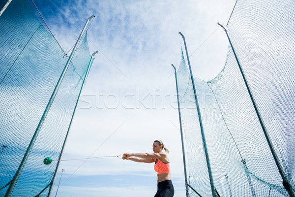 Female athlete performing a hammer throw Stock photo © wavebreak_media