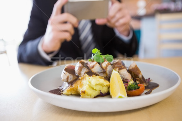 Man taking photograph of meal Stock photo © wavebreak_media
