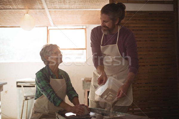 Male potter interacting with female potter Stock photo © wavebreak_media