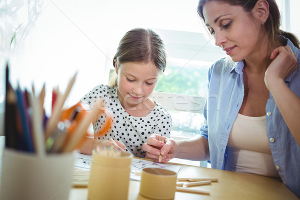 Mother and daughter drawing at table Stock photo © wavebreak_media