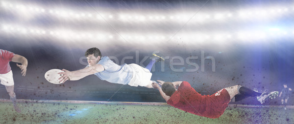 Composite image of a rugby player scoring a try Stock photo © wavebreak_media