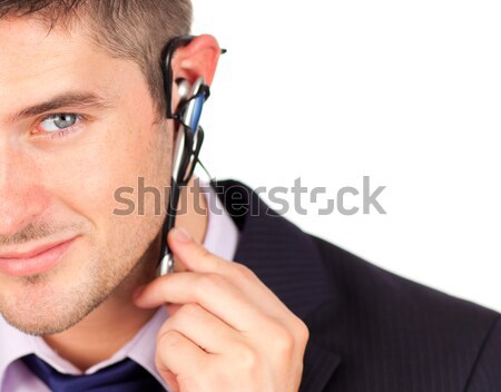 Stressed businesswoman tangled up in phone wires  Stock photo © wavebreak_media