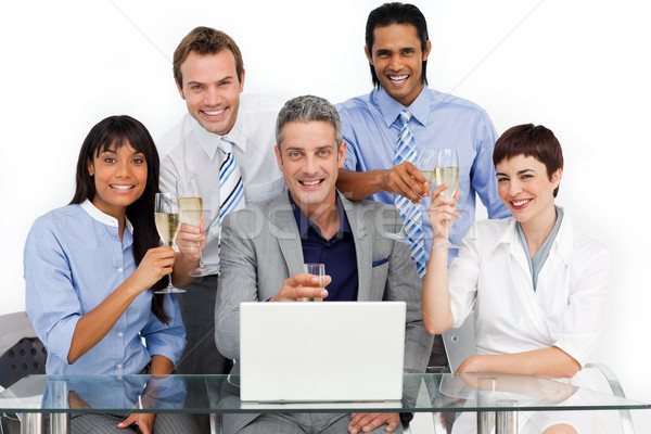 Lucky business team toasting with Champagne Stock photo © wavebreak_media