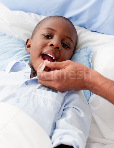 Small Boy sick in bed Stock photo © wavebreak_media