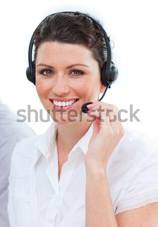Beautiful businesswoman with a headset on looking upwards Stock photo © wavebreak_media