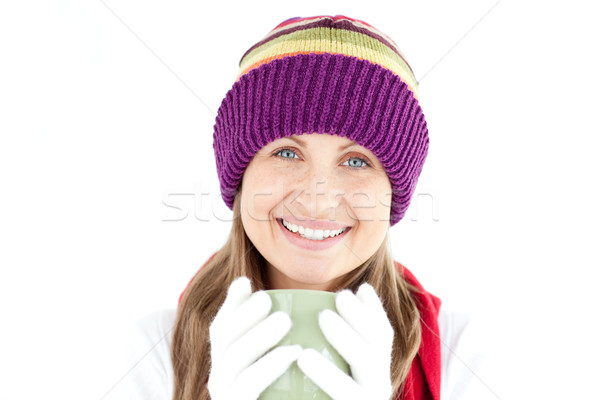 Joyful woman holding a cup a coffee  Stock photo © wavebreak_media