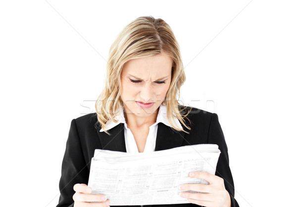 Depressed businesswoman holding a newspaper against a white background Stock photo © wavebreak_media