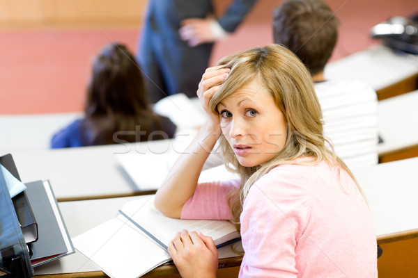 Portrait of a bored female student during a university lesson Stock photo © wavebreak_media