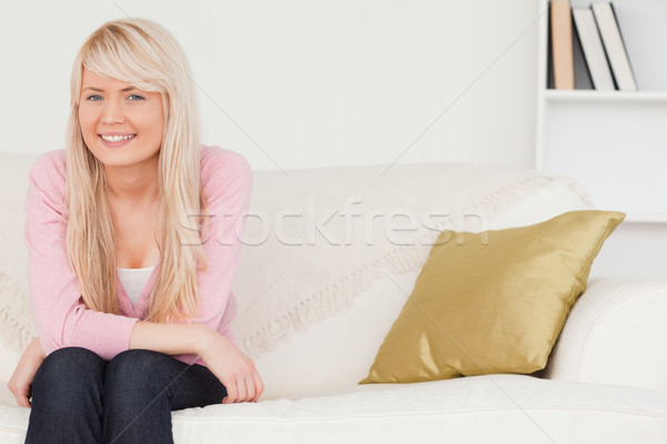 привлекательный позируют сидят диван гостиной Сток-фото © wavebreak_media