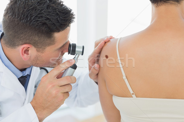 Médico toupeira de volta mulher médico do sexo masculino Foto stock © wavebreak_media