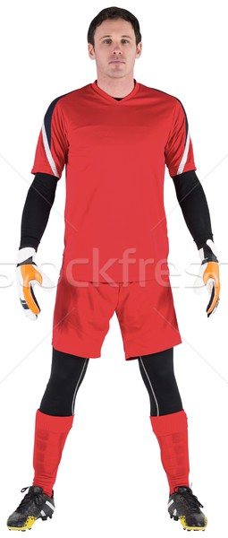 Goalkeeper in red looking at camera Stock photo © wavebreak_media