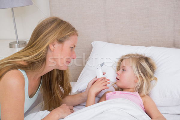 Stock photo: Cute sick girl being looked after