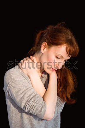 Scared woman holding herself  Stock photo © wavebreak_media