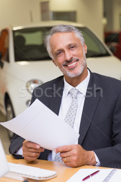 Smiling businessman looking at camera Stock photo © wavebreak_media