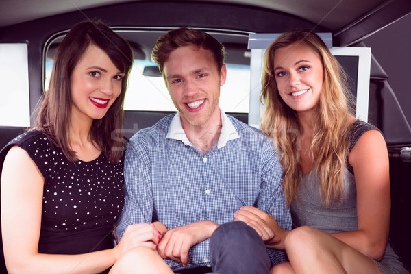 Pretty girls with ladies man in the limousine Stock photo © wavebreak_media