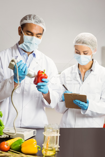 Alimentaire scientifique appareil poivre Université homme [[stock_photo]] © wavebreak_media