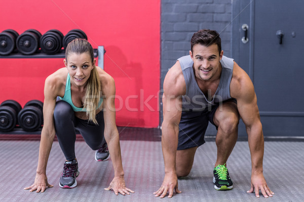 Muscular couple on the starting position  Stock photo © wavebreak_media