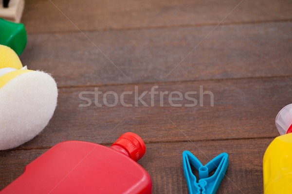 Cleaning equipments arranged on wooden floor Stock photo © wavebreak_media