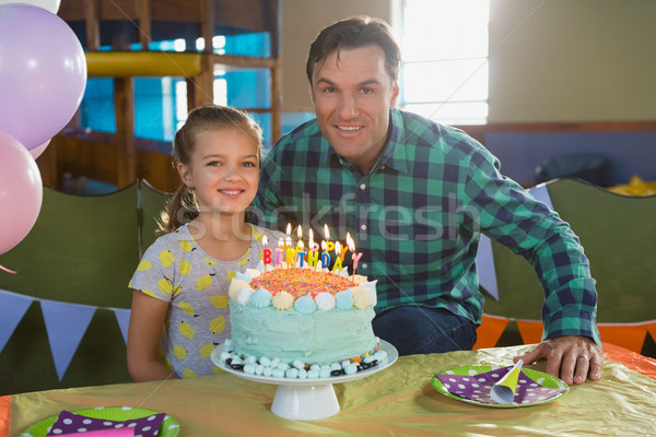 Father and daughter celebrating birthday at home Stock photo © wavebreak_media