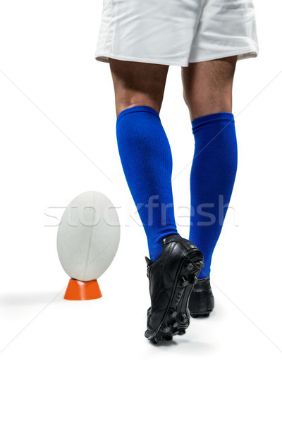 Low section of rugby player going to kick the ball Stock photo © wavebreak_media