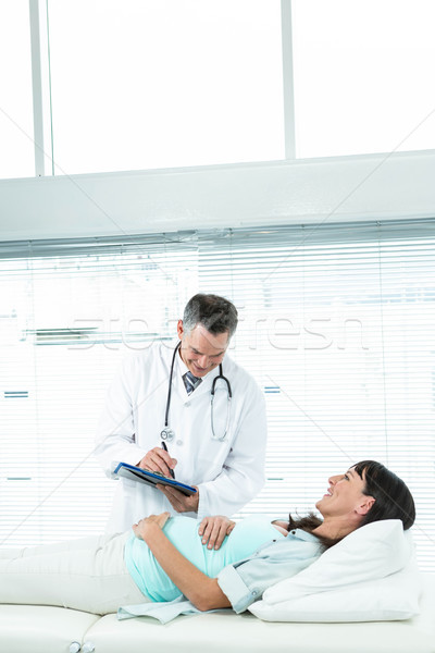 Doctor examining a pregnant woman Stock photo © wavebreak_media