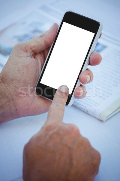 Mannelijk handen smartphone tabel nieuws Stockfoto © wavebreak_media