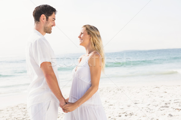 Para trzymając się za ręce plaży kobieta sexy Zdjęcia stock © wavebreak_media